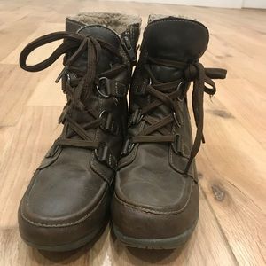Light and dark brown hiking boots.